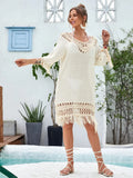 Apricot coloured hand-crocheted women's beach dress with lining on a mannequin