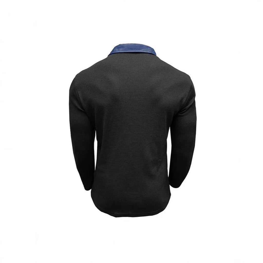 Man wearing a long-sleeved waffle-knit polo shirt in a solid colour with asymmetric detailing.
