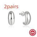 C-shaped geometric earring in sterling silver with gold electroplated finish