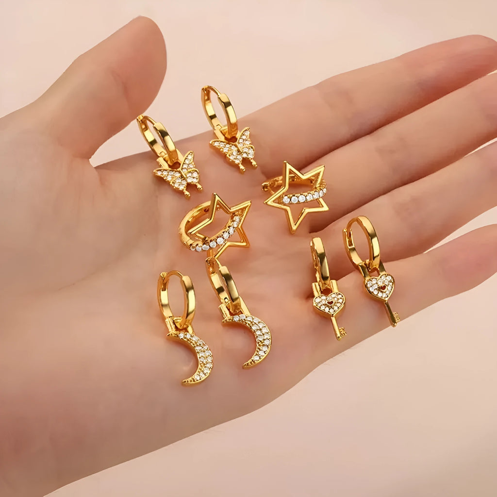 Women's geometric butterfly earrings with heart, star, and bow designs in copper with diamond treatment