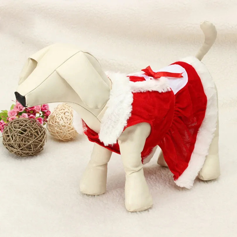 Red acrylic knit dog Christmas clothing in Red Clothes style, lying on a white background