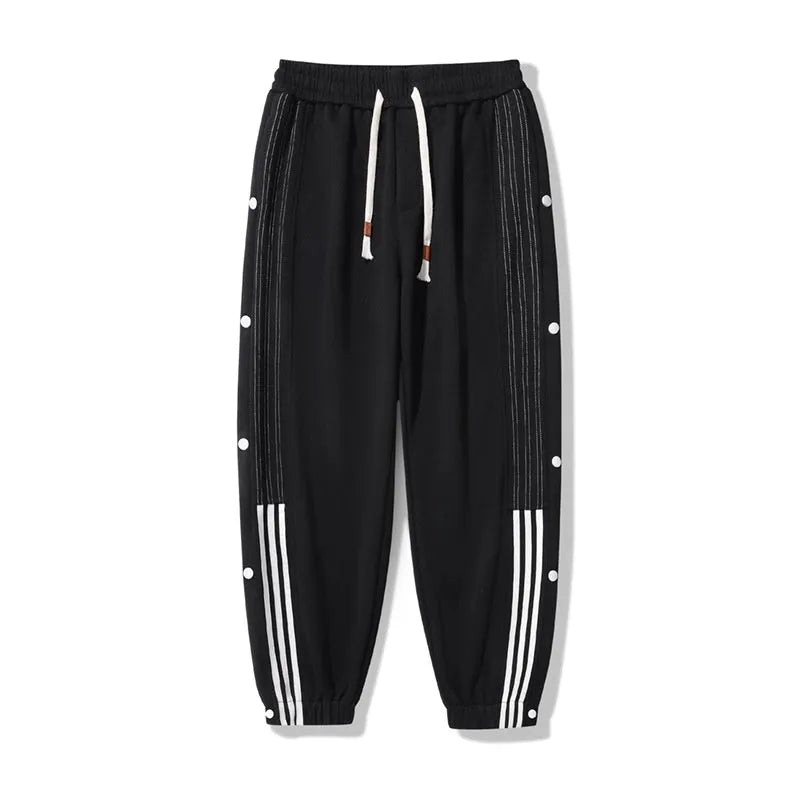 Men's black loose sports sweatpants with ankle ties and elastic high waist