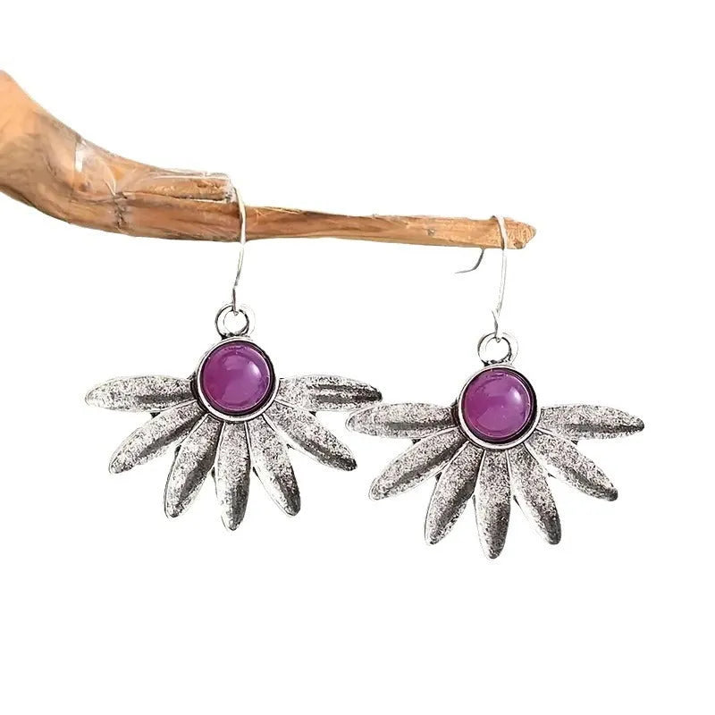Purple resin Bohemian earrings with floral animal zodiac designs on alloy findings