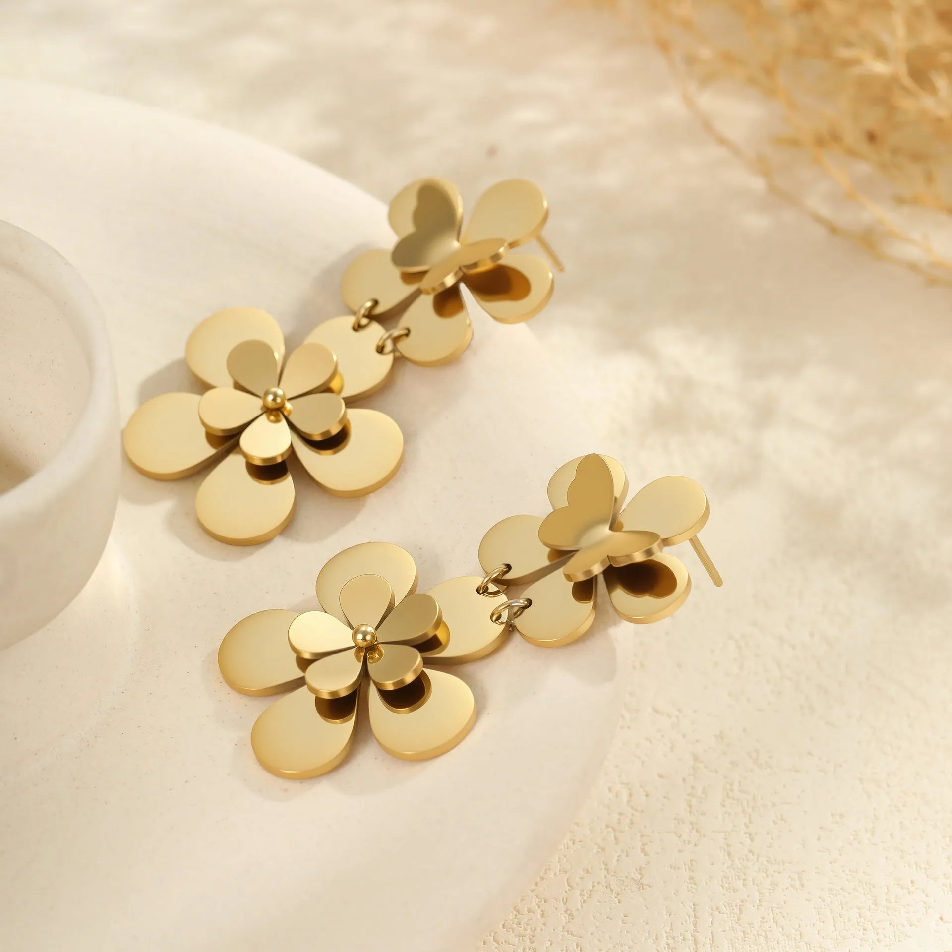 Gold flower butterfly stainless steel earrings with geometric design and 18K electroplated finish