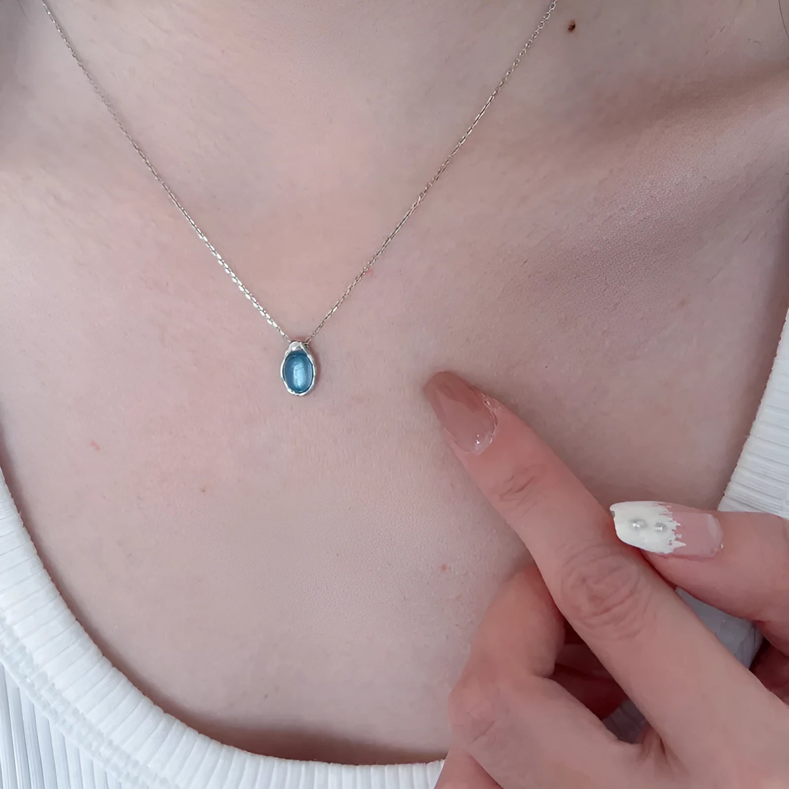 Navy blue water drop necklace with geometric pendant on cross chain, adjustable 41-50cm length