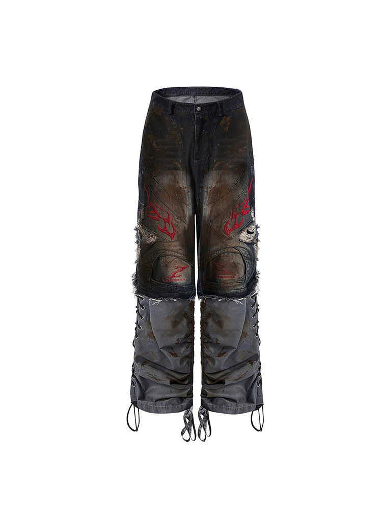 Men's light blue retro jeans with detachable legs showing wide loose fit and mid-high waist
