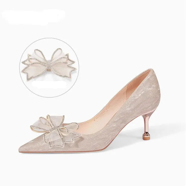 Women's champagne coloured sequined stiletto heel pumps with pointed toe.