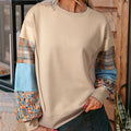 Women's loose fit plaid long sleeve top in apricot colour with regular sleeves