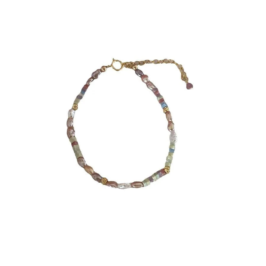Handmade natural pearl bracelet and necklace set with 14K gilded purple silver accents and irregular pendant
