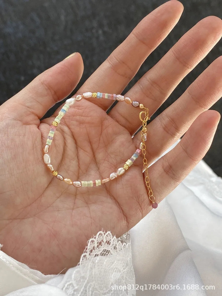 Handmade natural pearl bracelet and necklace set with 14K gilded purple silver accents and irregular pendant