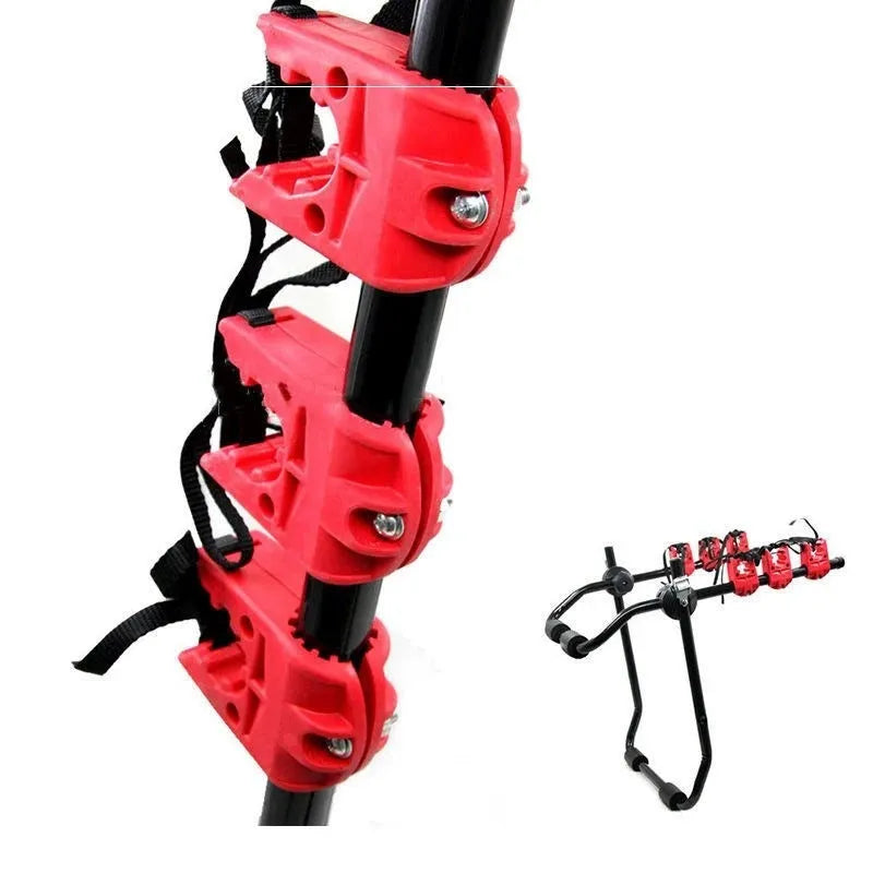 Black and red iron-framed car boot bike rack with tie rope fastenings.