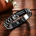 Men's curved stainless steel lettering bracelet with engraved text and titanium construction