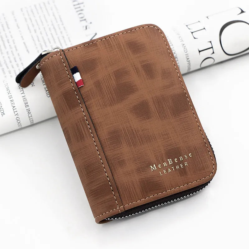 Men's retro short wallet clutch in soft polyurethane leather with letter motif, square vertical shape, available in black and brown colours.