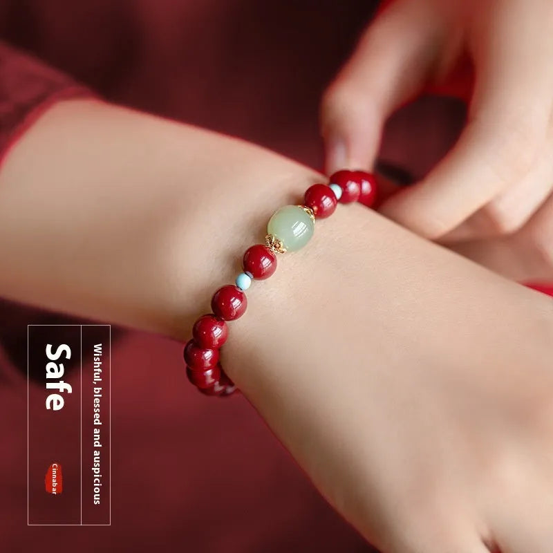 Purple Gold Sand cinnabar bracelet with geometric ellipse beads in 6mm, 8mm, or 10mm sizes on a wrist.