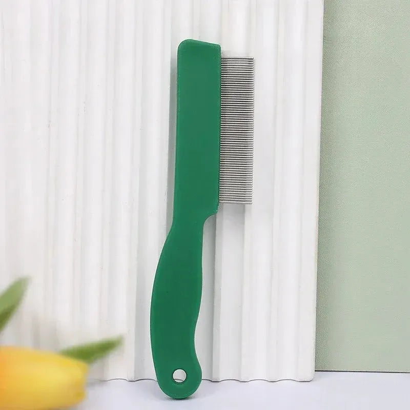 Green plastic handle flea comb with stainless steel pins for dogs and cats, shown next to a ruler indicating 129mm length.