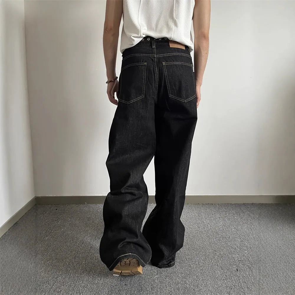 Black retro straight-leg jeans with loose wide-leg fit and zip fly