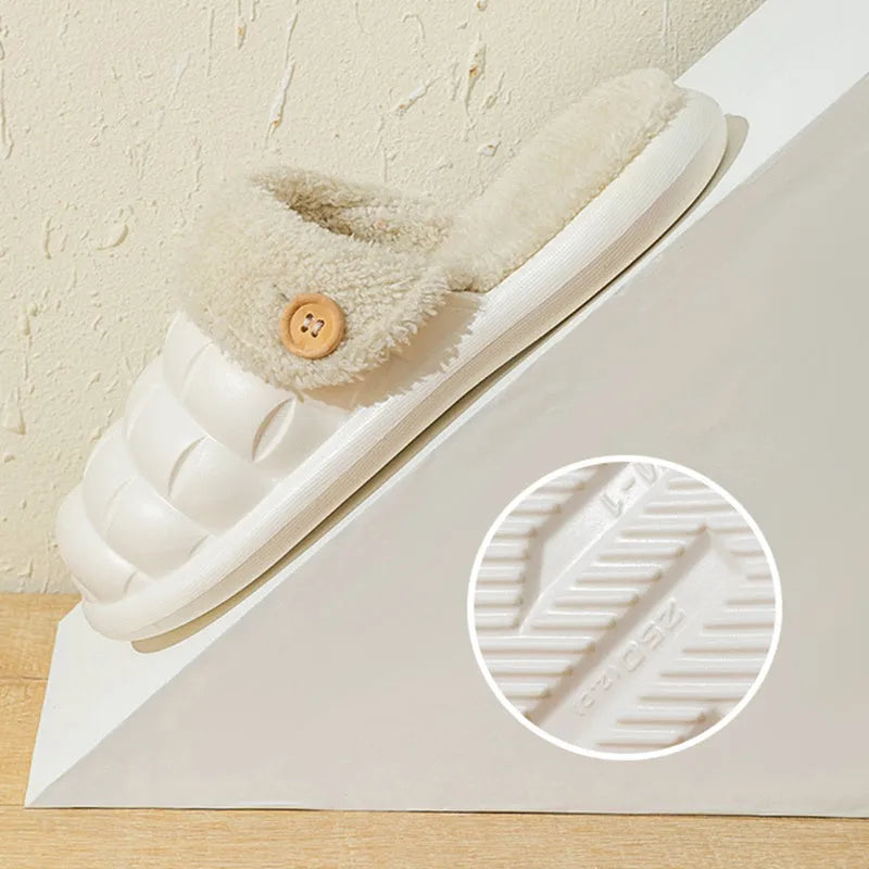 Women's pink and grey plaid detachable slippers with plush lining and a textured non-slip sole.