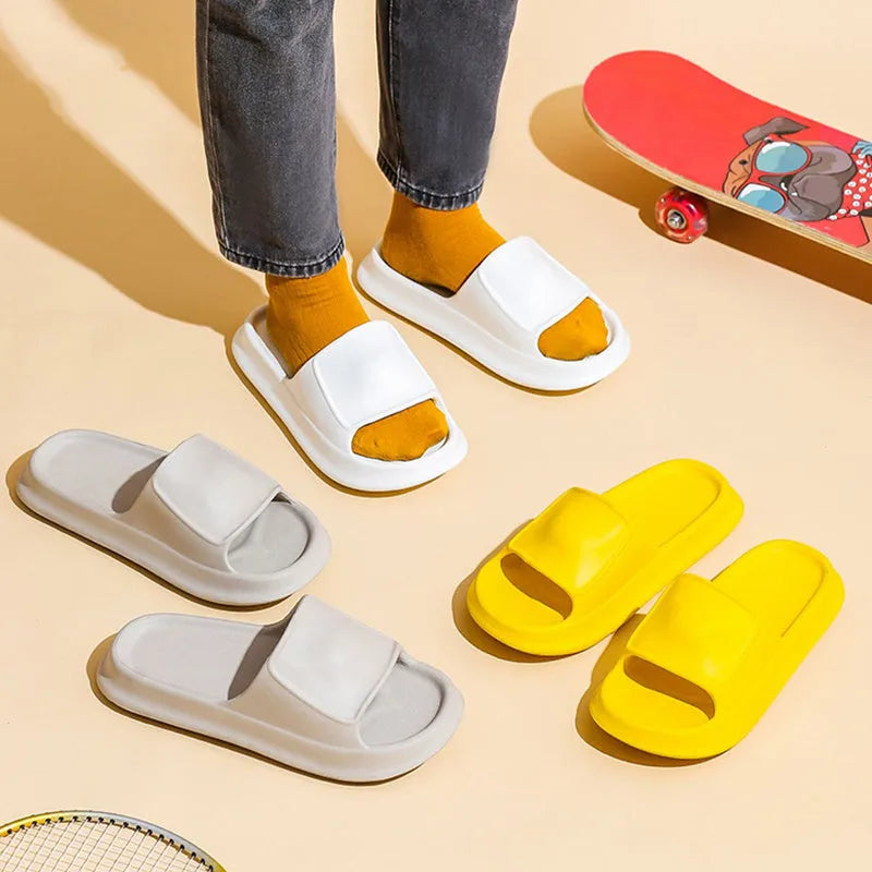 Thick-soled EVA foam flip-flop slippers for men and women in assorted colours on a white background.