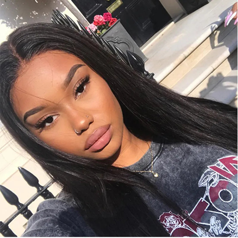 Long straight synthetic wig with centre parting and bangs in black colour