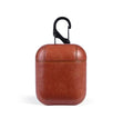 Genuine leather protective case for Apple Airpods in various colours showing charging port access.
