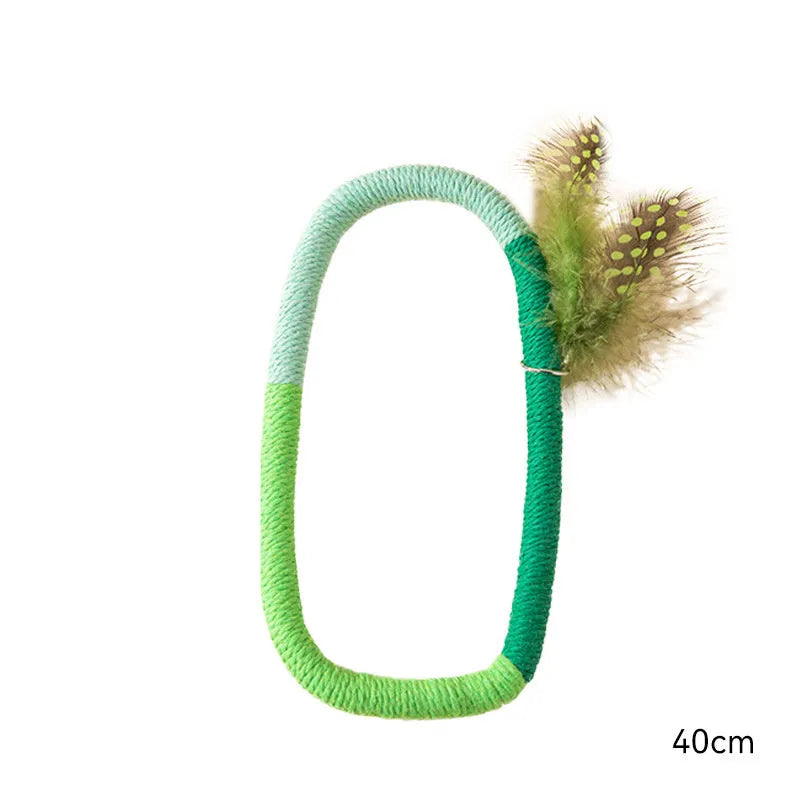 Green circular cotton rope cat toy with feathers and catnip for interactive feline play