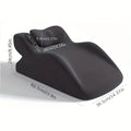 A stomach sleeper pillow shown in light grey, designed for prone positions and reading in bed.