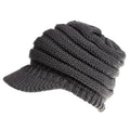 Women's thick knit ponytail beanie in acrylic yarn showing hairstyle accommodation