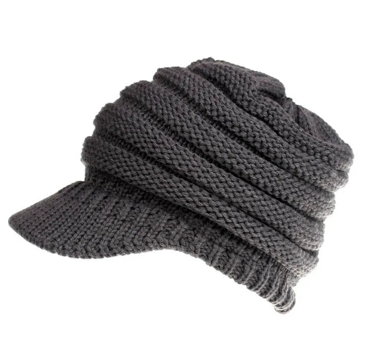 Women's thick knit ponytail beanie in acrylic yarn showing hairstyle accommodation
