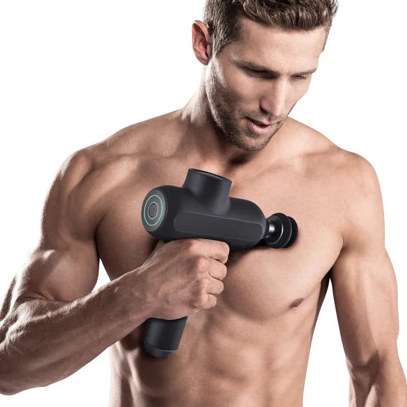 Black rechargeable muscle massager with six different massage heads showing five gear settings