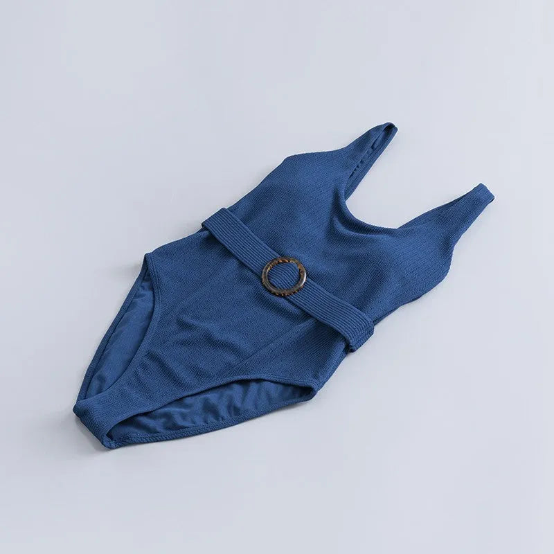 Navy blue women's one-piece slimming swimsuit with triangle design and chest pad support