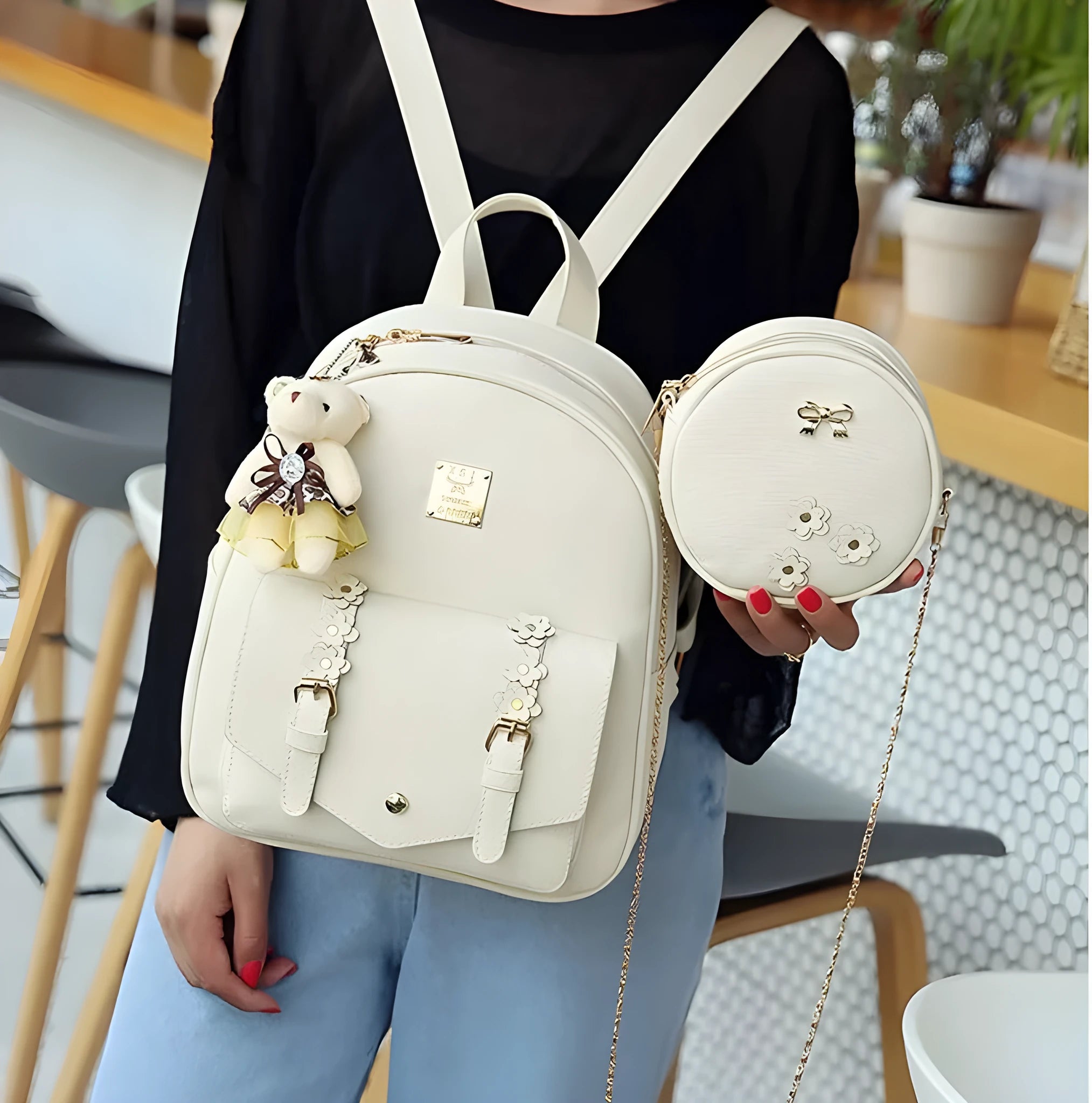 Women's three-piece PU leather backpack set with matching shoulder bag and card wallet in floral design