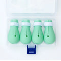 Set of four green silicone cat paw covers designed as anti-scratch gloves for pet washing and medication