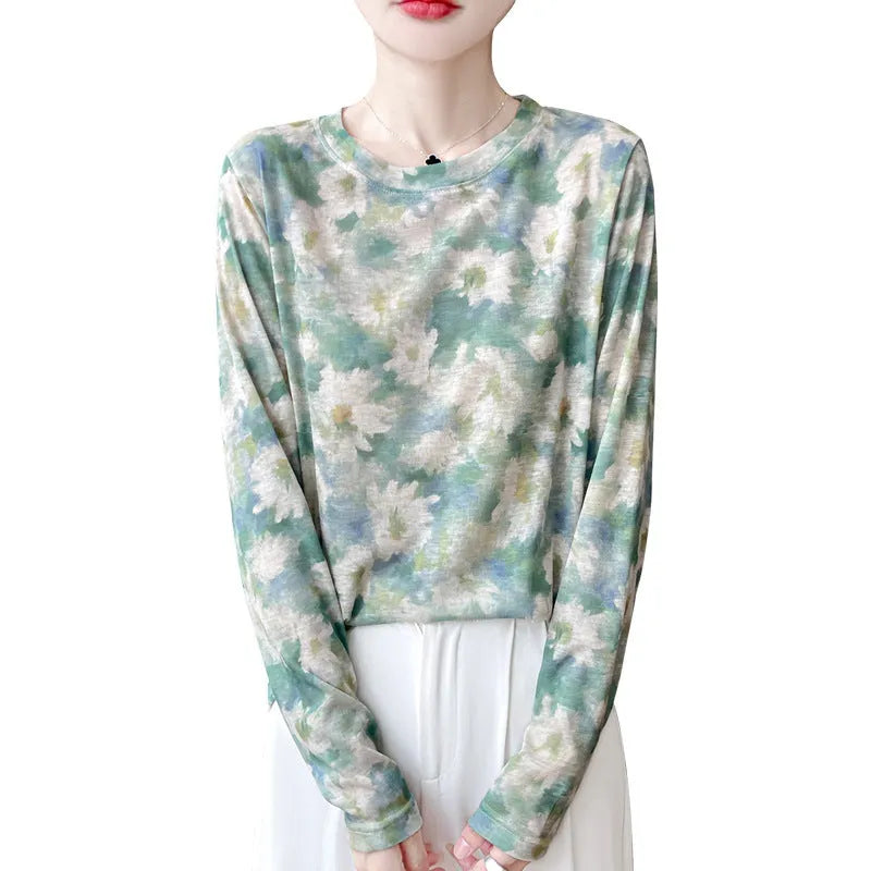 Women's round neck Tencel cotton pullover shirt in a floral print, showing front view.