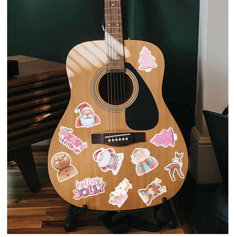 Pack of 50 cute Christmas-themed waterproof vinyl stickers for decorating cars, phones, and computers.