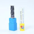 Carbide four-flute spiral milling cutter with straight shank on a white background.