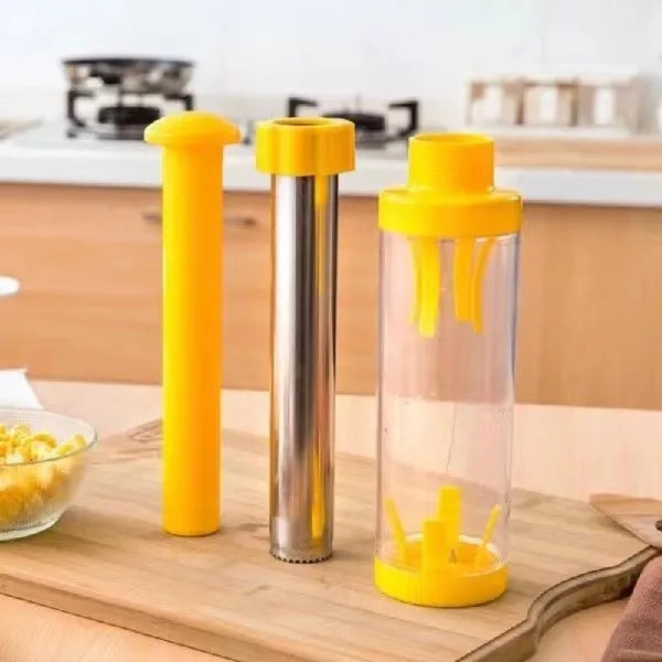 Yellow manual corn stripper with cylindrical ABS plastic body and stainless steel insert on white background