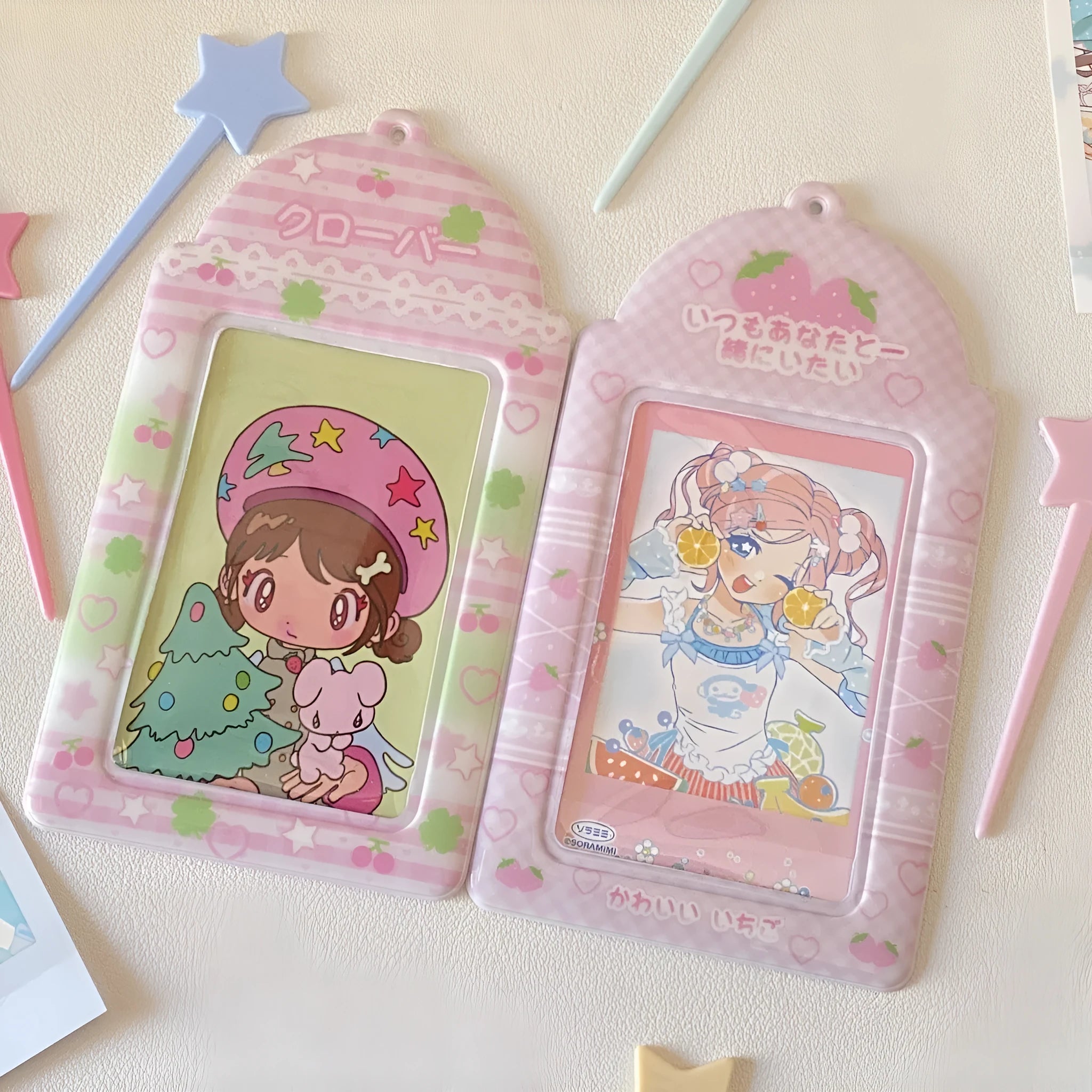 Cartoon strawberry or four-leaf clover PVC meal card holder measuring 7.6cm by 13.6cm