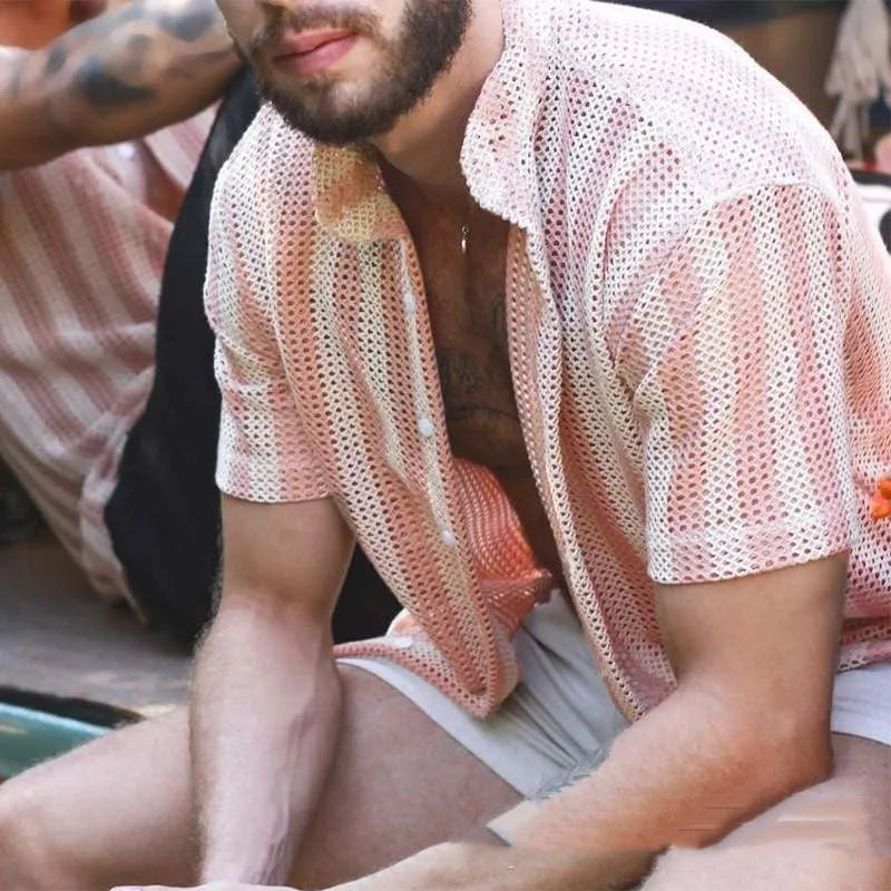Men's pink loose-fit waffle-textured short-sleeve cardigan shirt on a hanger.