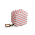 Cloth makeup storage bag with a cube shape and plain pattern, shown in blue colour.