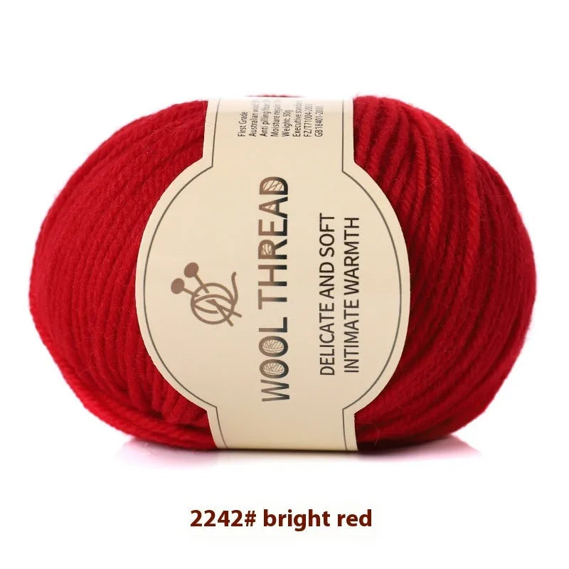 Roll of wool knitting thread for hand-knitted scarves and sweaters in various colour options