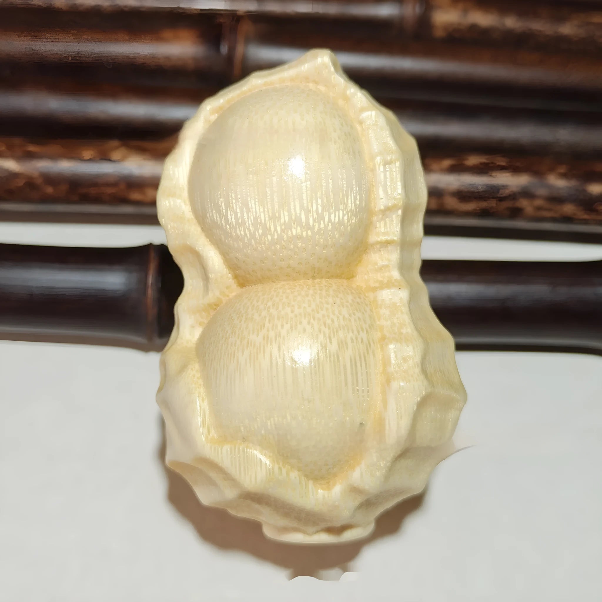 Natural solid bamboo carving peanut ornament with modern simplicity design for gift giving