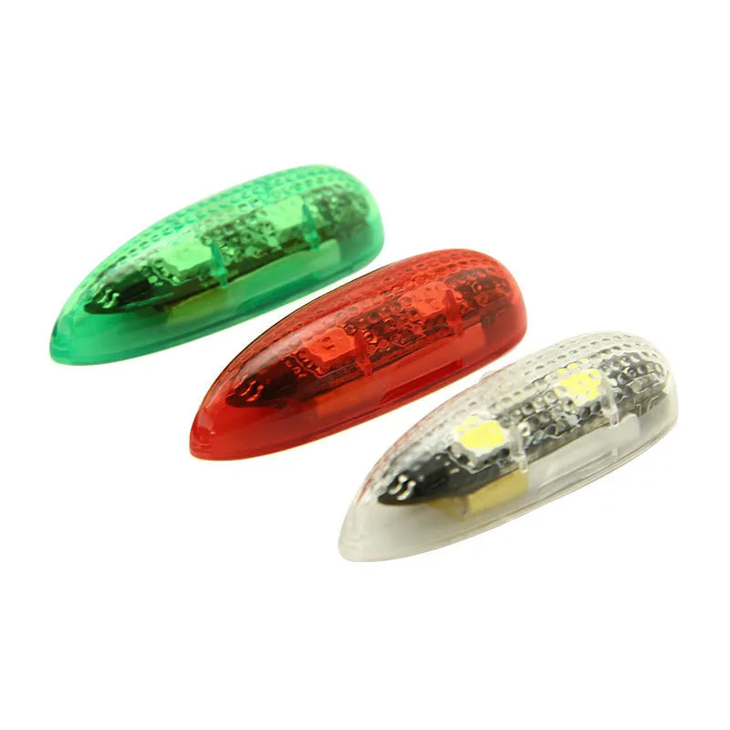 V3 wireless charging navigation light for RC models showing compact size and multiple colour options