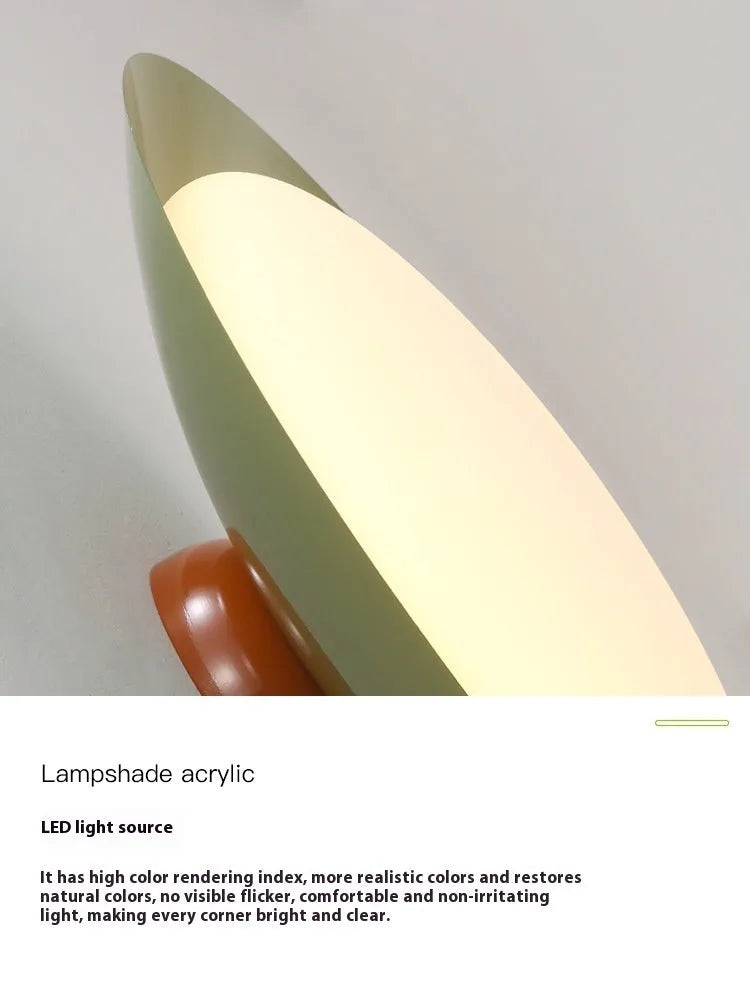 Modern cream-style flying saucer ceiling lamp with an iron shade, shown in a bedroom setting.