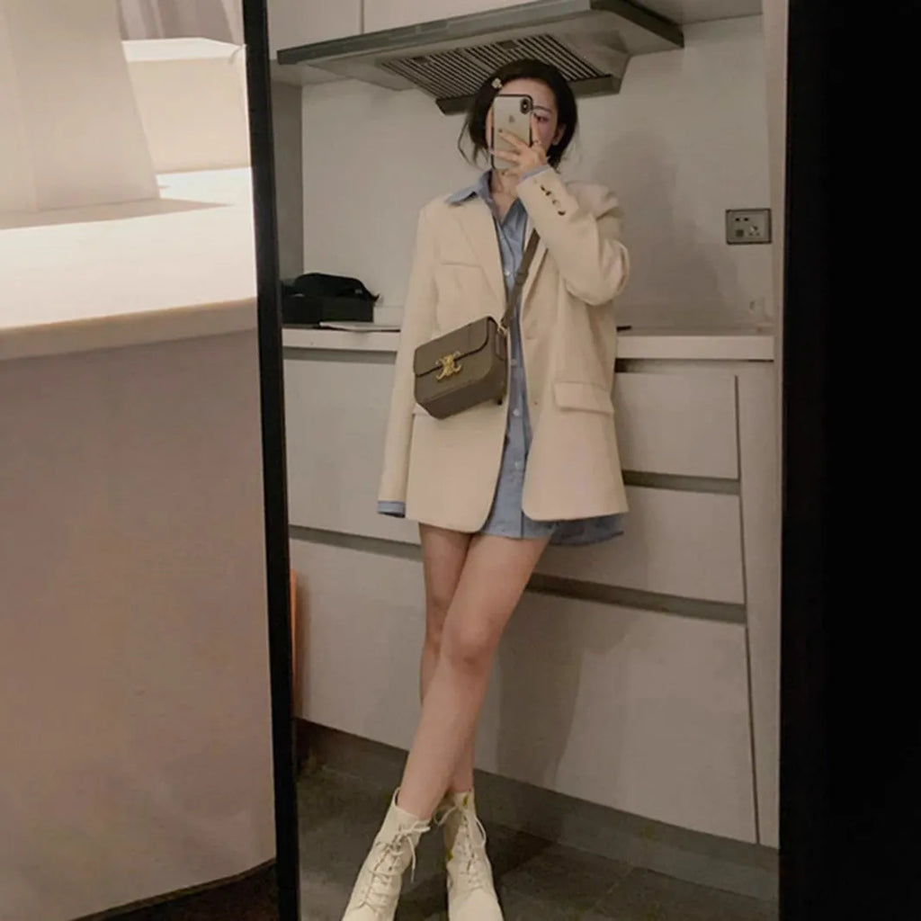 Korean style small suit jacket in polyester fabric available in milky white, black and brown colours