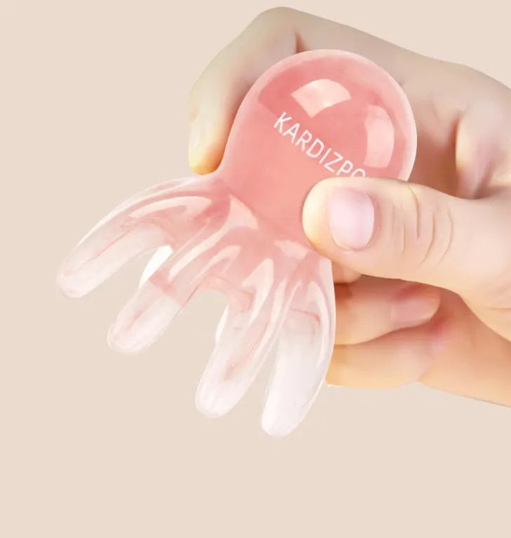Pink octopus-shaped natural resin massage comb for periocular meridian treatment