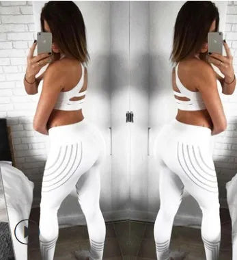 Women's black workout leggings with night-glowing print patterns, high-waisted pencil pants design