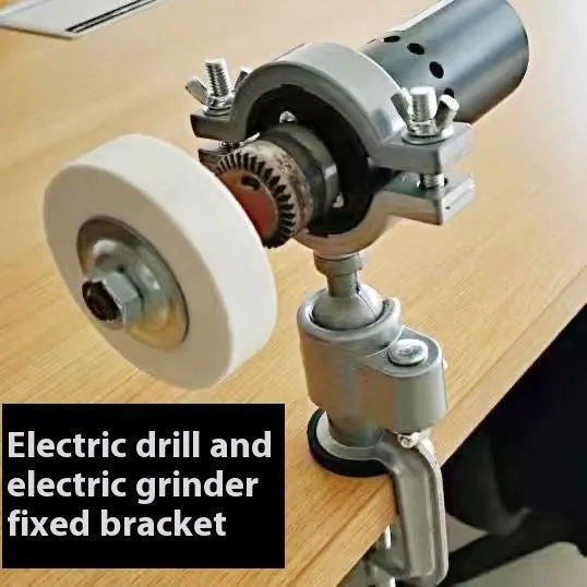 Small flat 360-degree rotating clamp-on bench vise made of tungsten steel on a workbench
