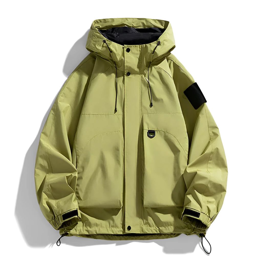 A man wearing a black windproof waterproof hooded jacket made from polyester blend fabric.