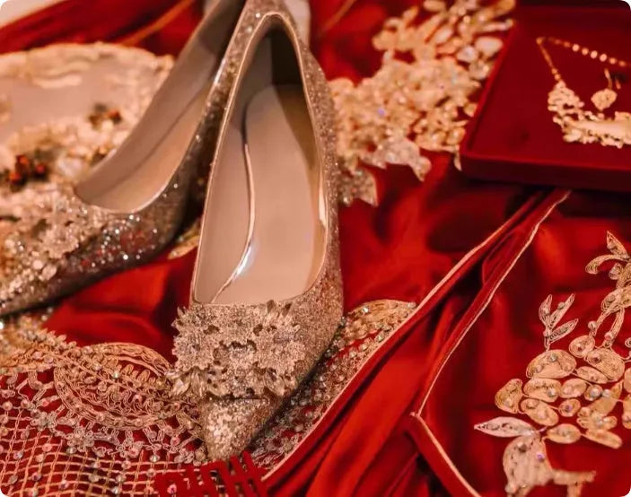 Champagne Xiuhe wedding shoes with rhinestones, pointed toe, fine heel, and one foot kick closure.