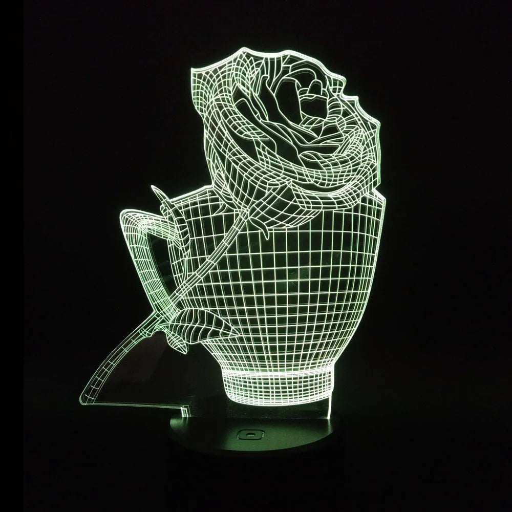 3D rose flower night light with colour-changing LED and remote control on a black base.